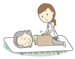 訪問治療をする女性